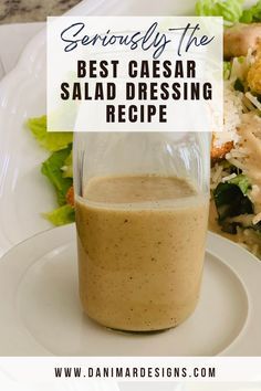 a salad dressing in a jar on a plate with the words seriously the best caesar salad dressing recipe