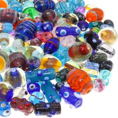 a pile of glass beads sitting on top of each other