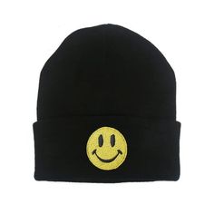 The beanie features a playful touch with a smiley face embroidery on the front. This adds a fun and whimsical element to the beanie, making it perfect for those who want to add a touch of personality to their outfit. The embroidery is high-quality and durable, ensuring that it will last through many seasons of use. Whether you're looking to make a statement or just want to add a bit of fun to your cold weather wardrobe. It's a great choice for outdoor activities, such as hiking or skiing, as wel Black Novelty Beanie For Winter, Black Novelty Beanie One Size Fits Most, Novelty Black Beanie, One Size Fits Most, Black Novelty Beanie, Black Novelty Beanie Hat, Novelty Black Beanie Hat, Fun Black Warm Hats, Novelty Winter Streetwear Hats, Playful Black Warm Hats