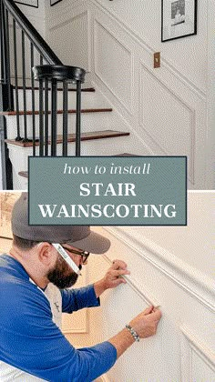 a man in blue shirt and hat painting stairs with white paint on the side wall