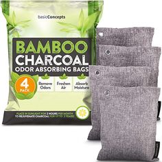 three bags of bamboo charcoal sitting next to each other