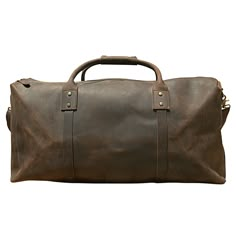 An extra-large duffle, crafted from the finest, vintage-appearing leather, this highly functional duffle bag is designed to tote everything from clothing to a laptop. It is large enough for storing a laptop (up to 17''), clothing, and shoes. It has double zips top open and a side pocket. It also has other interior pockets for storing things like your charger and mobile phone. Its shoulder strap is adjustable and removable. Outer 100% vegetable tanned, worn look, genuine cowhide leather. Inner 100% cotton cloth lined. YKK zipper. This bag is a unisex bag. Wipe clean with damp cloth. Use professional leather caring kit. Rugged Large Capacity Duffle Bag For Travel, Rugged Brown Duffle Bag With Large Capacity, Rugged Brown Travel Bag With Large Capacity, Classic Rectangular Travel Bag With Waxed Finish, Rugged Large Capacity Brown Travel Bag, Vintage Oiled Leather Travel Bag, Rugged Large Capacity Weekender Bag For Everyday Use, Rugged Brown Travel Bag With Luggage Sleeve, Rugged Large Capacity Duffle Bag For Overnight Trips