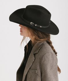 The Dean Western Hat features a pinched crown and a natural mid-length upturned brim with an attached tonal leather band + silver buckle detailing. The Dean is a classic timeless style hat with a touch of modern refinement. Classic Flat Crown Hat Bands For Fall, Classic Rigid Fedora Felt Hat, Classic Curved Brim Hat For Fall, Elegant Wide Brim Fedora For Rodeo, Classic Black Hat For Ranch, Classic Adjustable Hats For Fall, Classic Adjustable Hat For Fall, Elegant Fedora With Curved Brim For Rodeo, Black Wide-brim Riding Hat