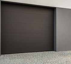 a garage door is open on the side of a building