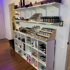 the shelves are filled with many different types of cosmetics and beauty products, including perfumes