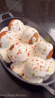 a pan filled with different types of food