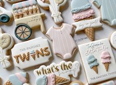 some cookies that are on top of a white tablecloth with words and pictures around them