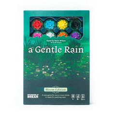 a book with flowers in it on top of a white surface and the title, a gentle rain