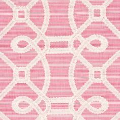 a pink and white fabric with an intricate design on the front, in different shades