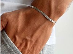 Add a touch of elegance to your outfit with our Men's Stainless Steel Italian Chain Bracelet! 💪✨ Crafted from durable stainless steel, this bracelet features a sleek, silver Italian chain design that's perfect for any occasion. 🔹 Size: 17 cm + 5 cm extension chain 🔹 Material: High-quality Stainless Steel 🔹 Color: Classic Silver 🔹 Adjustable: Fits most wrist sizes comfortably Whether you're dressing up for a special event or just adding a stylish accessory to your everyday look, this bracele Old Money Bracelet Men, Mens Silver Bracelets, Mens Silver Bracelets Chain, Men’s Bracelet, Cheap Adjustable Men's Chain Bracelet, Luxury Tarnish Resistant Men's Chain Bracelet, Masculine Adjustable Stainless Steel Bracelet, Boys Bracelets, Mens Chain Bracelet Jewelry1000.com