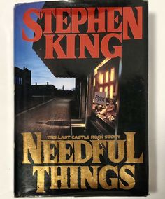 a book cover with the words needful things on it