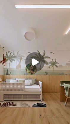 a living room with wooden flooring and wallpaper on the walls is decorated with giraffes