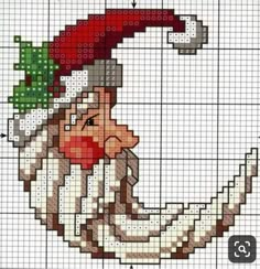 a cross stitch pattern with an image of a man in a santa claus hat on his head