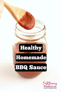 a spoon full of bbq sauce with the words healthy homemade bbq sauce