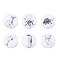 six buttons with sea animals on them