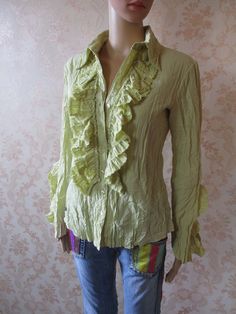 "Fabulous yellow crushed fitted blouse in yellow. It has a lace ruffle down to waist level and flared ruffled sleeves. There is a collar and buttons down the front. This item is flattering and in good condition. Bust, pit to pit;  18\" Inside sleeve;  18\" Length from back collar;  25\" Made by DES FILLES A LA VANILLE 69% polyester 31% viscose" Affordable Yellow Vintage Blouse, Bohemian Top With Ruffled Collar, Fitted Green Blouse For Summer, Bohemian Yellow Summer Shirt, Fitted Long Sleeve Peasant Blouse, Yellow Fitted Shirt For Fall, Fitted Yellow Shirt For Fall, Yellow Stretch Long Sleeve Blouse, Fitted Peasant Blouse For Fall