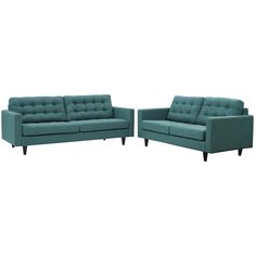 two blue couches sitting next to each other