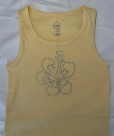 a yellow tank top with an octopus on it