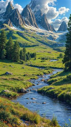 the mountains are covered in snow and green grass, with a stream running between them