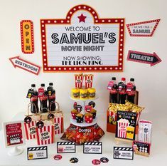 a movie themed birthday party with popcorn, soda bottles and snacks on the table in front of a welcome to samuel's movie night sign