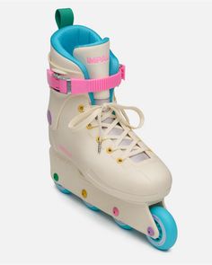 the roller skates are white with blue and pink wheels on it's side