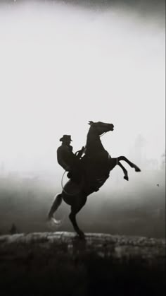 a man riding on the back of a horse