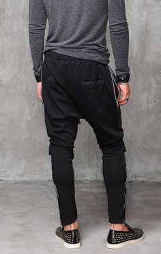 PLEASE KEEP IN MIND **Item takes up to 1-3 business weeks for production and 100% handmade ****-**This gorgeous comfortable black loose drop crotch pants will be your "Must have " garment for the new season...So comfy and easy to wear at the same time a touch of elegance and style... --- YKK Zipper ---** Men in the picture wearing size : LARGE - 1/80 Height 75 kgFit True to Size - So pick up your actual size.:)Thank you for visiting my shop ^^SMILE ALWAYS^^ Black Relaxed Fit Hip Hop Parachute Pants, Black Hip Hop Parachute Pants With Relaxed Fit, Baggy Black Cotton Harem Pants, Hip Hop Style Black Sweatpants, Black Cargo Pocket Harem Pants For Streetwear, Baggy Black Sweatpants With Pockets, Black Loose-fit Parachute Pants For Streetwear, Black Harem Pants With Cargo Pockets For Streetwear, Black Baggy Sweatpants With Pockets