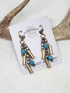 Triple 22 Caliber Turquoise Beaded Bullet Earrings from SureShot Jewelry Shell Casing Jewelry, Bullet Casing Crafts, Shotgun Shell Crafts, Leather Rings, Hunting Jewelry, American Stuff, Bullet Crafts, 22 Caliber, Bullet Earrings