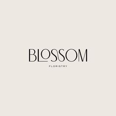 the logo for blossom floristry is shown in black on a light gray background