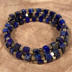 Handmade By Shelly, One Of A Kind Fashion Jewelry. Brand New. Beautiful Sodalite Cubed Beads In A Memory Wire Bracelet. Fits Most. #171 Adjustable Blue Lapis Lazuli Beaded Bracelets, Adjustable Lapis Lazuli Beaded Bracelet With Faceted Beads, Blue Spiritual Wrap Bracelet With Gemstone Beads, Spiritual Blue Gemstone Beads Wrap Bracelet, Spiritual Blue Wrap Bracelet With Gemstone Beads, Adjustable Blue Wrap Bracelet With Natural Stones, Blue Wrap Bracelet With Natural Stones For Healing, Blue Gemstone Beads Wrap Bracelet With Round Beads, Blue Gemstone Beads Wrap Bracelet