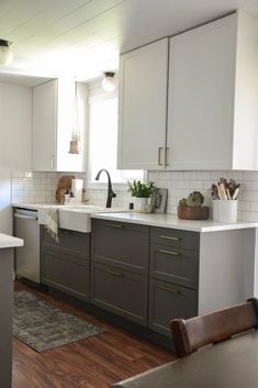 the kitchen is clean and ready to be used as a dining room or office space