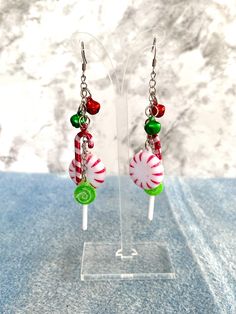 Christmas Candy Earrings with Bells Light Weight Holiday Sparkle Fun Multicolor Earrings For Holiday Gifts, White Dangle Earrings For Holiday, Holiday Dangle Earrings, Holiday Multicolor Earrings Perfect For Gifts, Holiday Multicolor Earrings As Gift, Handmade Multicolor Earrings For Holiday, Holiday Multicolor Earrings As A Gift, Multicolor Earrings For Christmas Gift, Holiday Multicolor Handmade Earrings