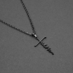 "Our Faith Cross Pendants are forged in solid premium steel and are lightweight for comfortable wear. The cross pendant spells out the word \"Faith\" in cursive which also resembles the shape of a cross. This men's pendant necklace is waterproof, tarnish proof and hypoallergenic. 24 inches long 2.5mm flat cable chain 33x20mm pendant Made of stainless steel Black plated   ► International orders are subject to tax/duty fees. This is uncontrollable on our end. Shipping can take up to 6 weeks due to customs. ► There are no returns/exchanges on sale items, personalized items, earrings, and custom length chains. ► For more information, please read our shop policies here on Etsy." Faith In Cursive, Mens Necklace Pendant, Faith Cross, In Cursive, Black Plates, Mens Pendant, Necklace For Men, Men's Necklace, Steel Necklace