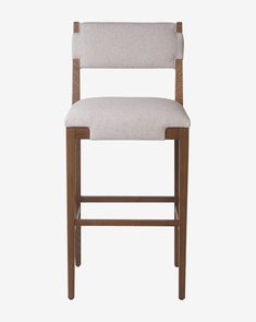 an upholstered bar stool with a beige seat and backrest, viewed from the front