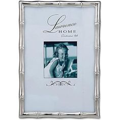 a silver frame with an image of a woman