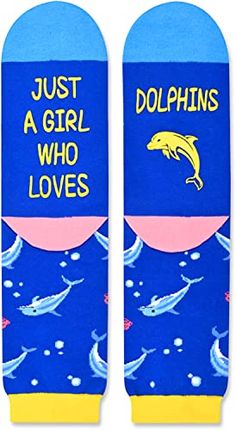 Dolphin SocksThese blue socks feature vibrant prints of lively dolphins, bubbles and shells, making them a stylish addition to any outfit. The socks have a funny saying "JUST A GIRL WHO LOVES DOLPHINS" .Size & PackageOne size fits most. Our women's crazy socks are designed to fit shoe sizes 6-12 and sock sizes 8-13. Each pair of funny socks comes in a plastic zippered bag.Quality MaterialOur cute animal socks are made of 80% Cotton, 15% Polyamide, and 5% Elastane to ensure that they are soft, co Shark Socks, Marine Gifts, Dolphin Gifts, Animal Socks, Gifts For Moms, Zippered Bag, Blue Socks, Sock Animals, Crazy Socks