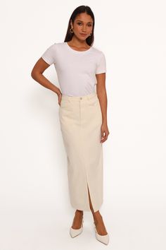 DETAILS   Our Midi Corduroy Skirt features belt loops and a functional button, ensuring a fit that's as secure as it is stylish. Whether youâ€™re accentuating your waist with a sleek belt or wearing it as-is, this skirt adapts to you.    midi length  belt loops  functional button  functional side pockets  corduroy design  front split detail  unlined  material - 100% cotton    SIZING     studio model is 5' 8" and wears a Size S    model stats: bust - 31", waist - 24", hips - 35"         GARMENT C Flowy Cream Midi Skirt, Cream Fitted Midi Skirt, Cream Midi Lined Skirt, Cream Flowy Midi-length Skirt, Beige Button Closure Midi Skirt, Wedding Swimwear, Corduroy Skirt, New Arrival Dress, S Models