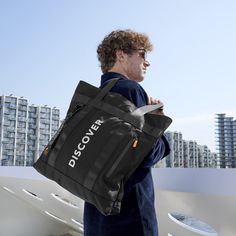 * Danish design 
 * Water-resistant 
 * Detachable tag Tote Bag For Men, Foldable Tote Bag, Lazy Bear, Urban Explorer, Travel And Adventure, Water Design, Black Tote, The Urban, Black Tote Bag