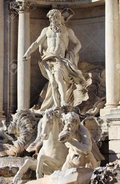 a statue in front of a building with columns and statues on the sides stock photo