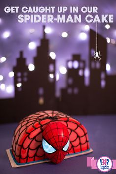 a spider - man cake with the caption get caught up in our spider - man cake