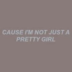 the words are written in white on a gray background, which reads cause i'm not just a pretty girl