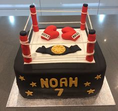 a cake made to look like a boxing ring