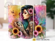 three coffee mugs decorated with tattoos and sunflowers, one is holding a cup