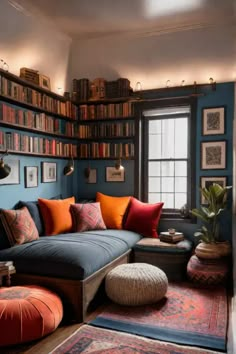 a living room filled with lots of furniture and bookshelves full of books on the walls