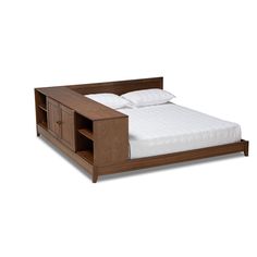 a bed with a wooden headboard and night stand on it's side, against a white background