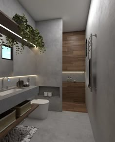 a bathroom with a plant hanging over the sink