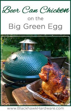 a big green egg sitting on top of a wooden table next to a bbq