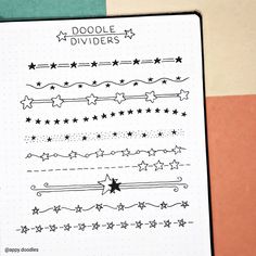 a notebook with doodle dividers and stars on it