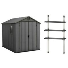 a gray shed next to a metal shelving unit