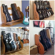 several guitars are lined up on the wall